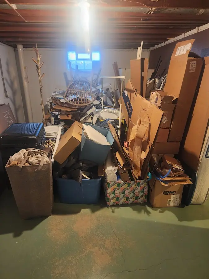 Roll-off dumpster container at job site for 2 Yard Dumpster Rental in McNair